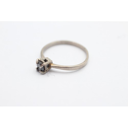 1085 - A 9ct white gold black moissanite solitaire ring, size P - approx. gross weight 2.4 grams