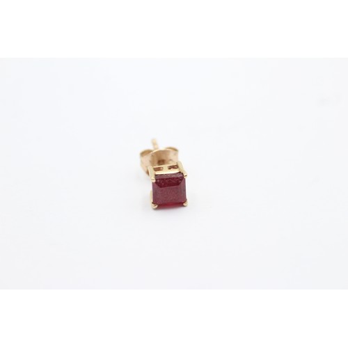 1086 - A pair of 9ct gold ruby stud earrings - approx. gross weight 1.4 grams