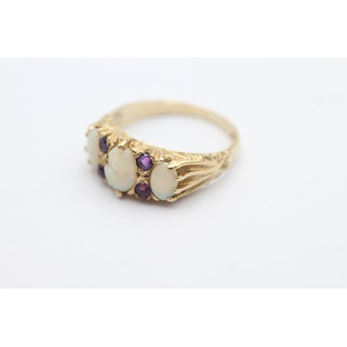 1087 - A 9ct gold opal and amethyst dress ring, size Q - approx. gross weight 3.3 grams