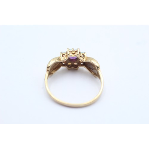 1092 - A 9ct gold opal and amethyst halo ring, size S - approx. gross weight 2.9 grams