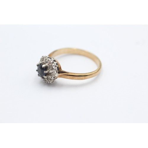 1094 - A 9ct gold diamond and sapphire halo ring, size N - approx. gross weight 2.8 grams