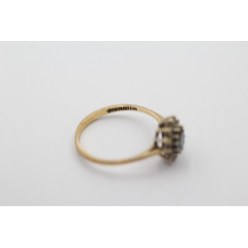 1107 - A 9ct gold topaz and clear gemstone halo ring, size K - approx. gross weight 1.1 grams