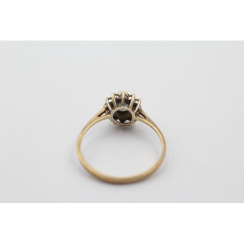 1107 - A 9ct gold topaz and clear gemstone halo ring, size K - approx. gross weight 1.1 grams