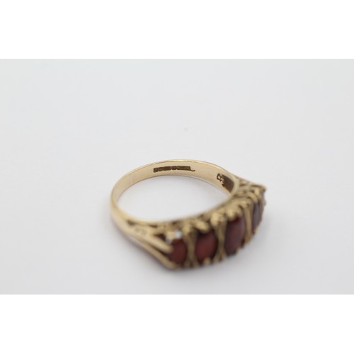 1112 - A 9ct gold garnet five stone ring, size O - approx. gross weight 3.6 grams