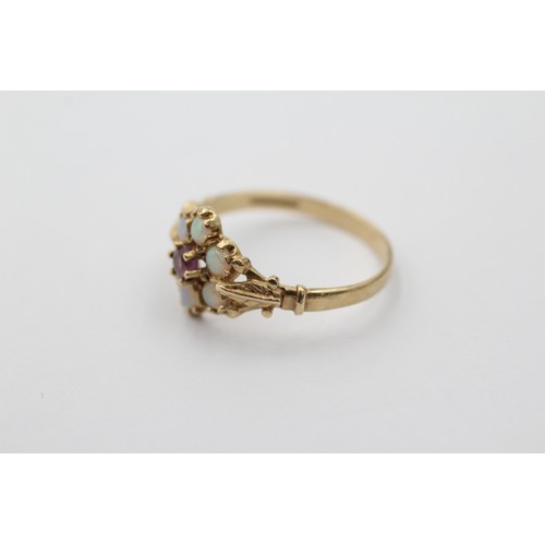 1114 - A 9ct gold ruby and opal floral cluster ring, size P½ - approx. gross weight 1.8 grams