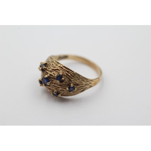 1118 - A 9ct gold sapphire textured dress ring, size N - approx. gross weight 3 grams