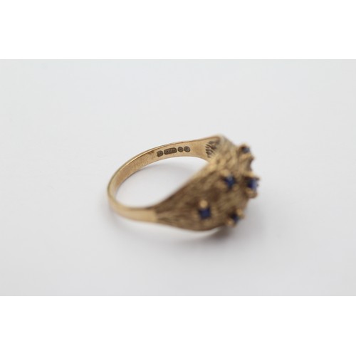 1118 - A 9ct gold sapphire textured dress ring, size N - approx. gross weight 3 grams