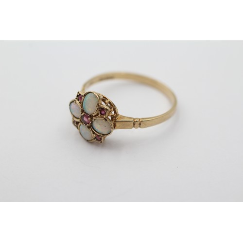 1119 - A 9ct gold ruby and opal dress ring, size Q - approx. gross weight 1.7 grams