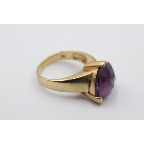 1120 - A 9ct gold trillion cut amethyst solitaire ring, size P½ - approx. gross weight 6.2 grams