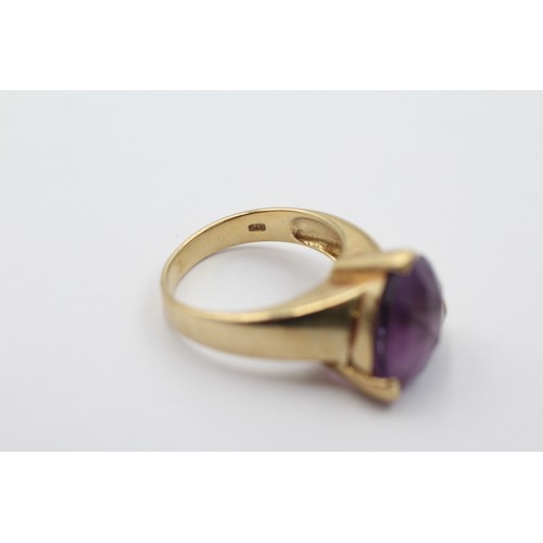 1120 - A 9ct gold trillion cut amethyst solitaire ring, size P½ - approx. gross weight 6.2 grams