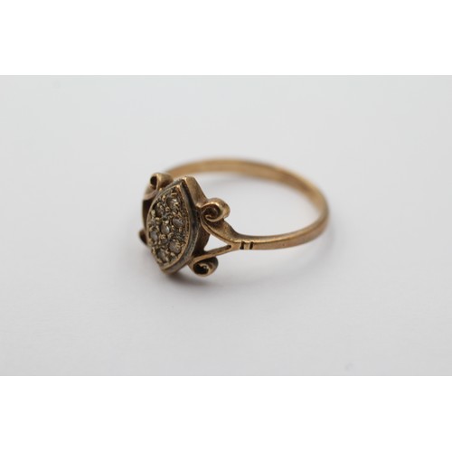 1125 - A 9ct gold diamond dress ring, size N - approx. gross weight 2 grams