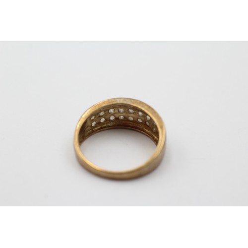 1127 - A 9ct gold diamond three row ring, size O - approx. gross weight 2.9 grams