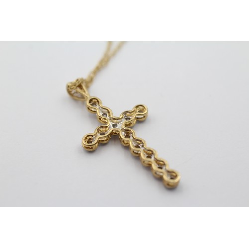 1131 - A 9ct gold diamond cross pendant necklace - approx. gross weight 2 grams and 23cm long