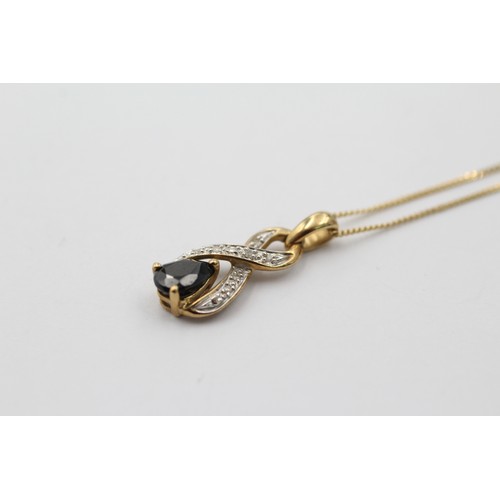 1133 - A 9ct gold diamond and sapphire pendant necklace - approx. gross weight 1.6 grams