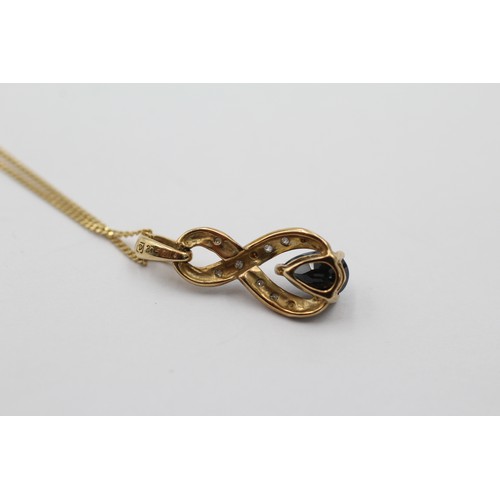 1133 - A 9ct gold diamond and sapphire pendant necklace - approx. gross weight 1.6 grams