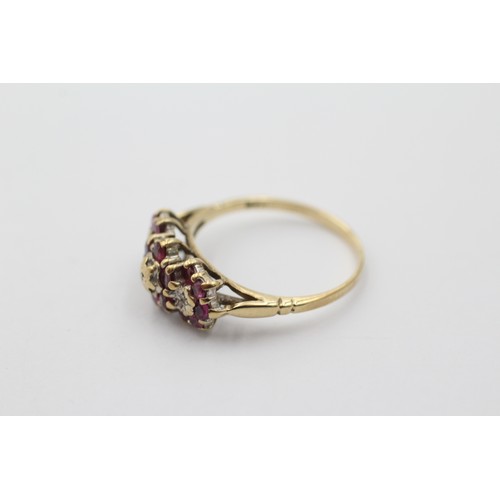 1134 - A 9ct gold diamond and ruby dress ring, size P - approx. gross weight 2.5 grams