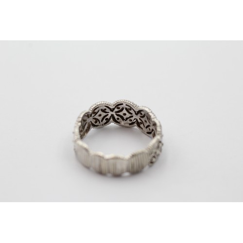 1138 - A 9ct white gold diamond dress ring with textured band, size N½ - approx. gross weight 3.5 grams