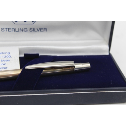 1299 - Two hallmarked sterling silver ballpoint pens - approx. gross weight 45 grams