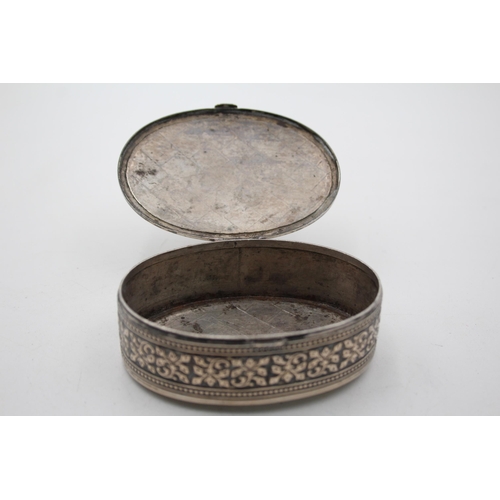 1305 - An .800 silver oval snuff box - approx. gross weight 71 grams and 8cm diameter