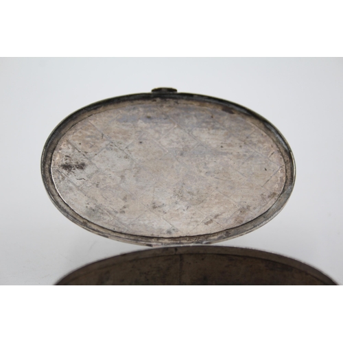 1305 - An .800 silver oval snuff box - approx. gross weight 71 grams and 8cm diameter