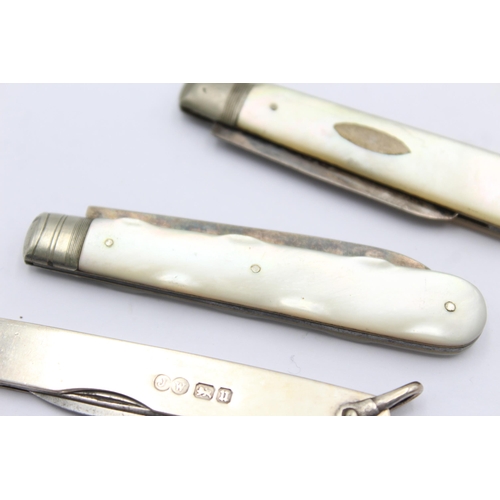 1306 - Three hallmarked sterling silver pocket knives, two with mother of pearl handles - approx. gross wei... 