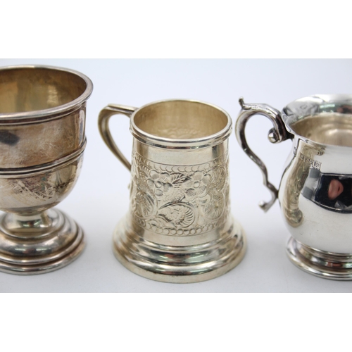 1312 - Three hallmarked sterling silver small tankards - approx. gross weight 75 grams