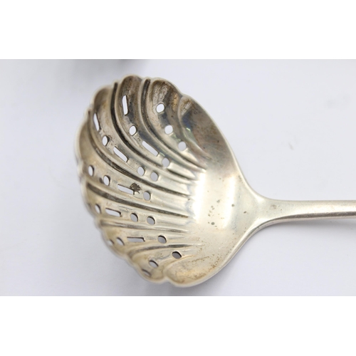 1313 - Two Victorian hallmarked sterling silver sugar sifter spoons - approx. gross weight 76 grams