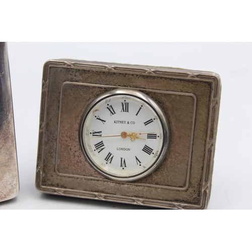 1318 - Two hallmarked sterling silver fronted quartz boudoir clocks, one Kitney & Co and one Carrs Sheffiel... 