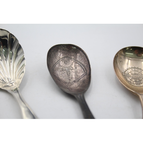 1319 - Three antique hallmarked sterling silver caddy spoons - approx. gross weight 36 grams