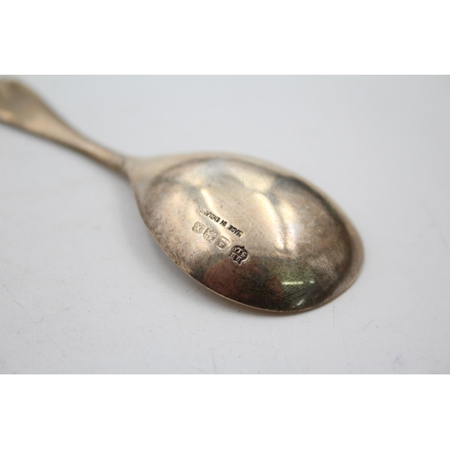 1319 - Three antique hallmarked sterling silver caddy spoons - approx. gross weight 36 grams