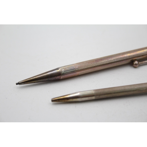 1320 - Two vintage sterling silver pencils - approx. gross weight 36 grams