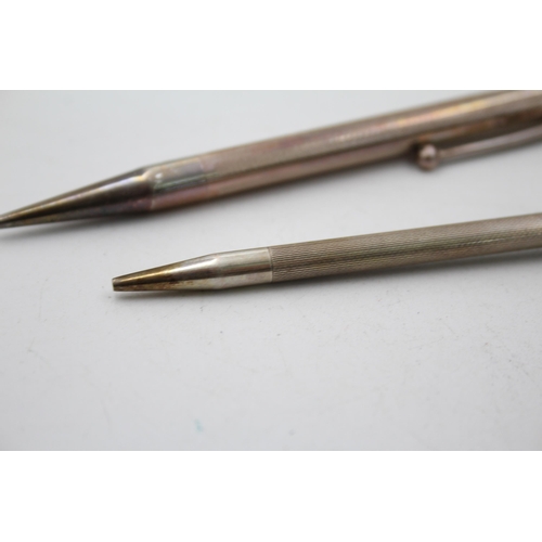 1320 - Two vintage sterling silver pencils - approx. gross weight 36 grams