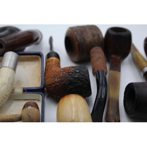 1376 - Ten vintage estate smoking pipes to include meerschaum etc.