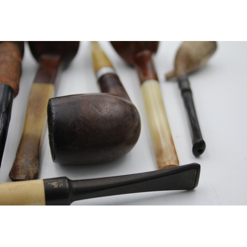 1376 - Ten vintage estate smoking pipes to include meerschaum etc.