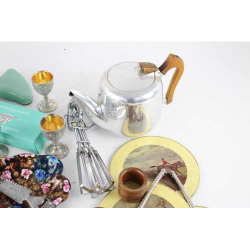 261 - A collection of vintage kitchenware to include meat grinder, whisk, Picquot ware etc.