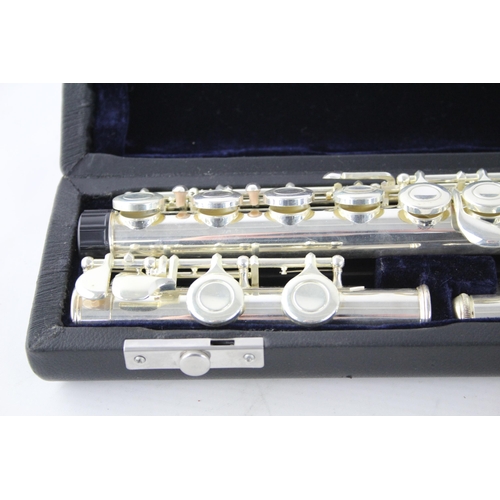 731 - A cased student flute