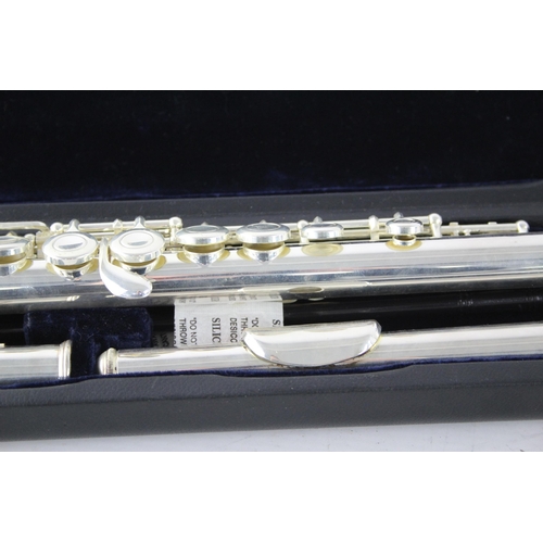 731 - A cased student flute