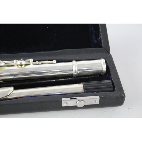 731 - A cased student flute