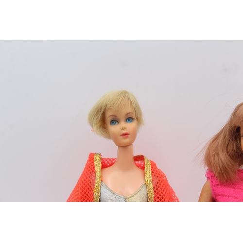 310 - Two Mattel Barbie Live Action fashion dolls with stand and clothing