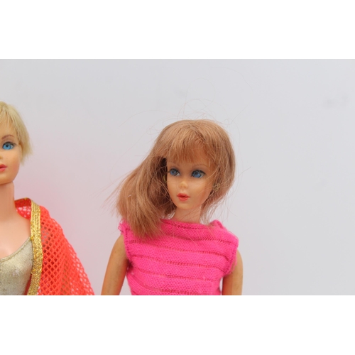 310 - Two Mattel Barbie Live Action fashion dolls with stand and clothing