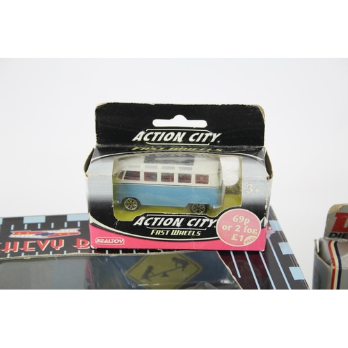 337 - A collection of vintage boxed diecast model vehicles to include Gearbox Chevy Bel Air, Dinky, Matchb... 