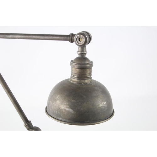 499 - An industrial style articulated desk lamp - approx. 71cm high