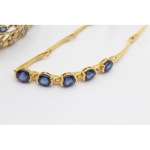 1160 - Two .925 silver gold tone and sapphire bracelets - approx. gross weight 45 grams