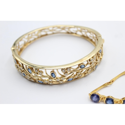 1160 - Two .925 silver gold tone and sapphire bracelets - approx. gross weight 45 grams