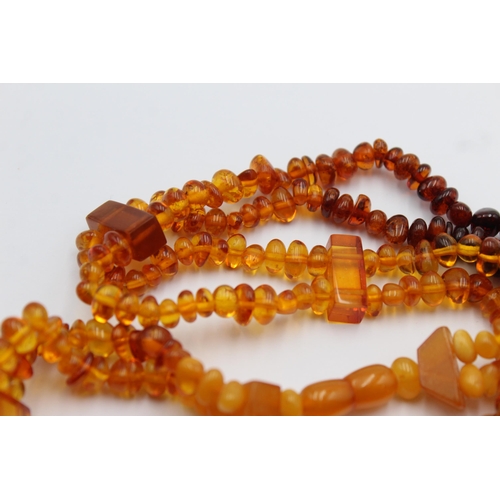 1161 - Two amber beaded necklaces - approx. gross weight 49 grams