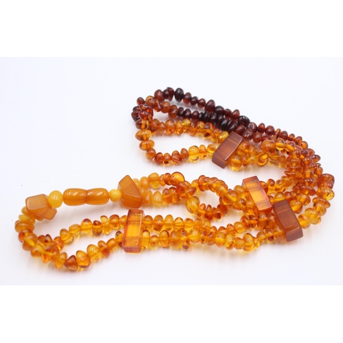 1161 - Two amber beaded necklaces - approx. gross weight 49 grams