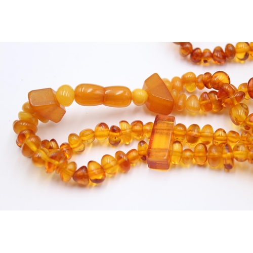 1161 - Two amber beaded necklaces - approx. gross weight 49 grams