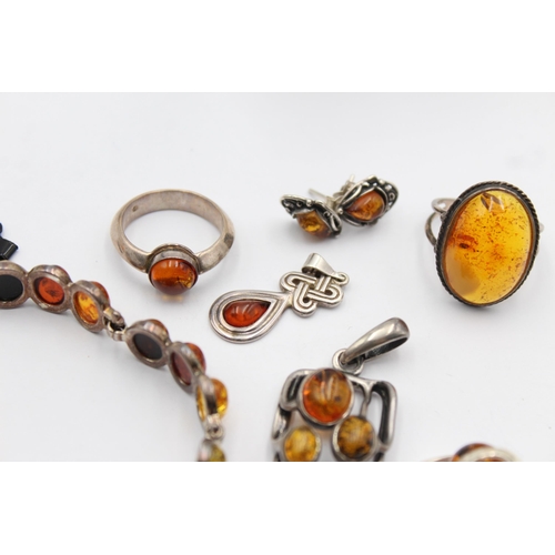 1168 - Eight pieces of .925 silver amber set jewellery - approx. gross weight 46 grams