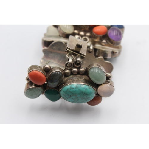 1175 - A .925 silver multi gemstone set bracelet - approx. gross weight 166 grams