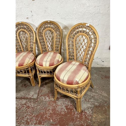 146 - Four cane dining chairs